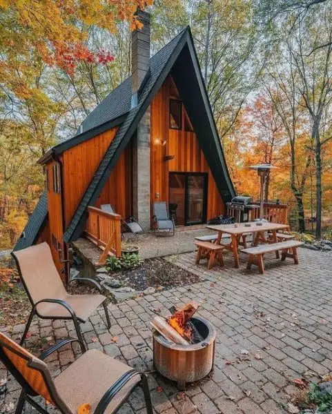 Charming And Contemporary A-Frame Log Cabin Nestled In Woods a-frame modern home
