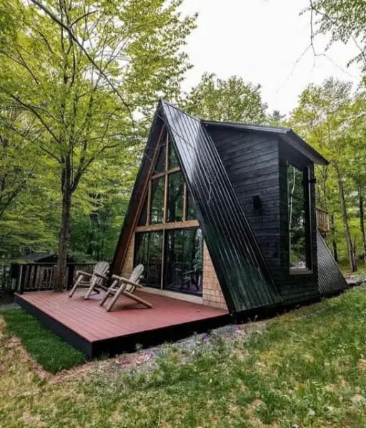 Sleek And Serene: A Minimalist A-Frame Cabin In The Woods a-frame modern home