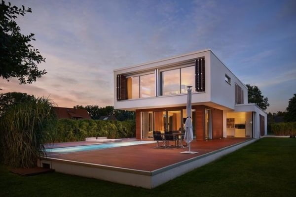 Breathtaking Golden Twilight Shot Of Luxurious Bauhaus Villa: A Premium Immobilien Capture bauhaus modern home