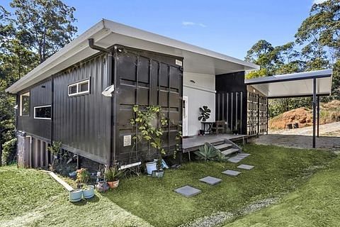 Sleek And Sustainable: A Modern Tiny Shipping Container Home beautiful tiny modern home