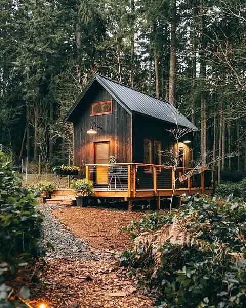 Sleek And Stunning Tiny Home: A-Frame Cabin Design With Off-Grid Living Features beautiful tiny modern home