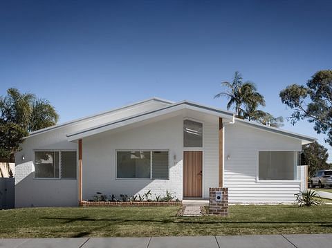 Seamlessly Modern Coastal Oasis: Engadine House Renovation By Shire Building Design coastal modern home