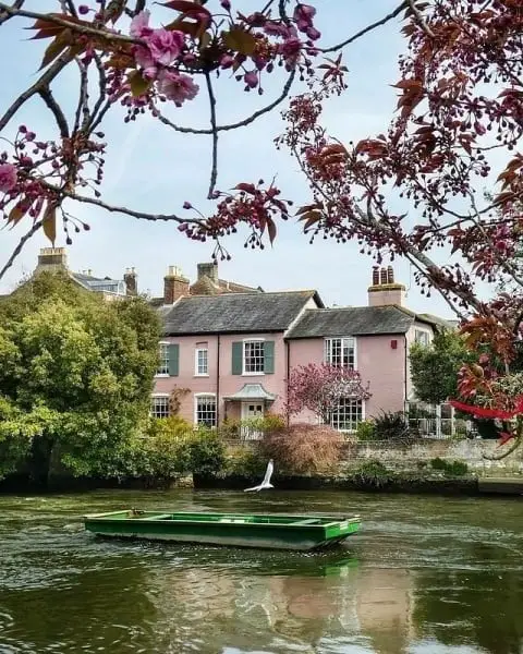 Dreamy Waterside Country Home Design In Pink Overlooking A River In Dorset country modern home