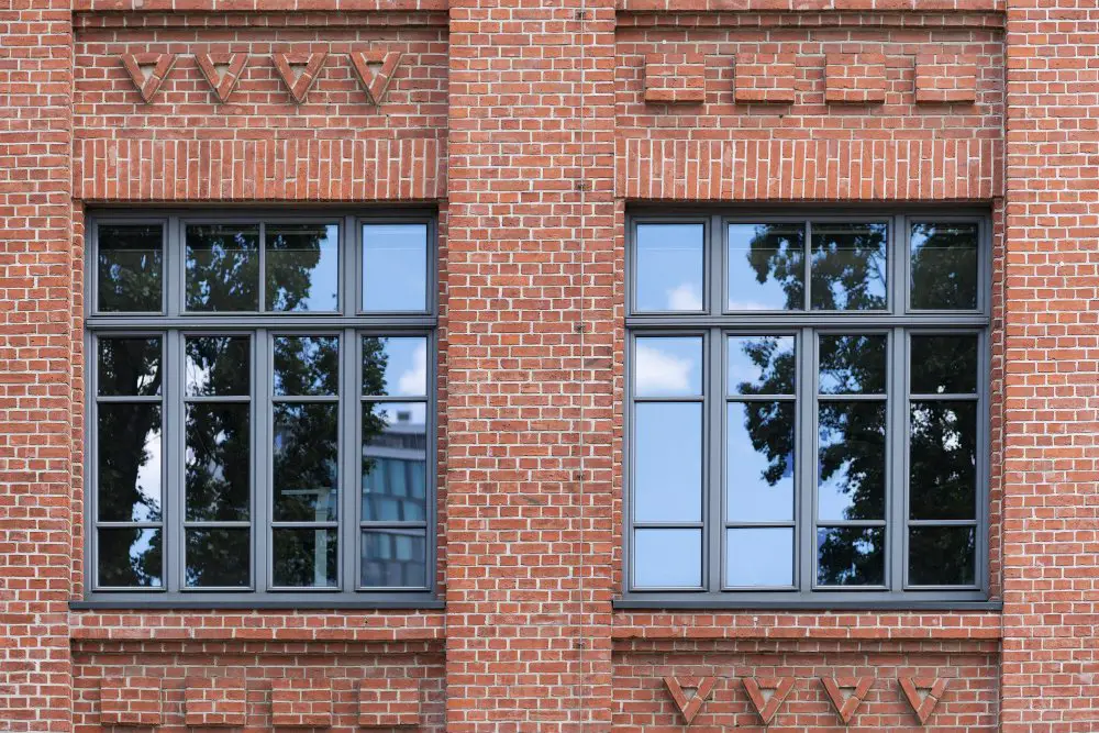 Black Window Frames Brick House
