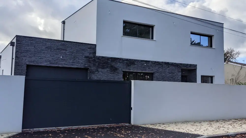 Grey Brick house With White Trim